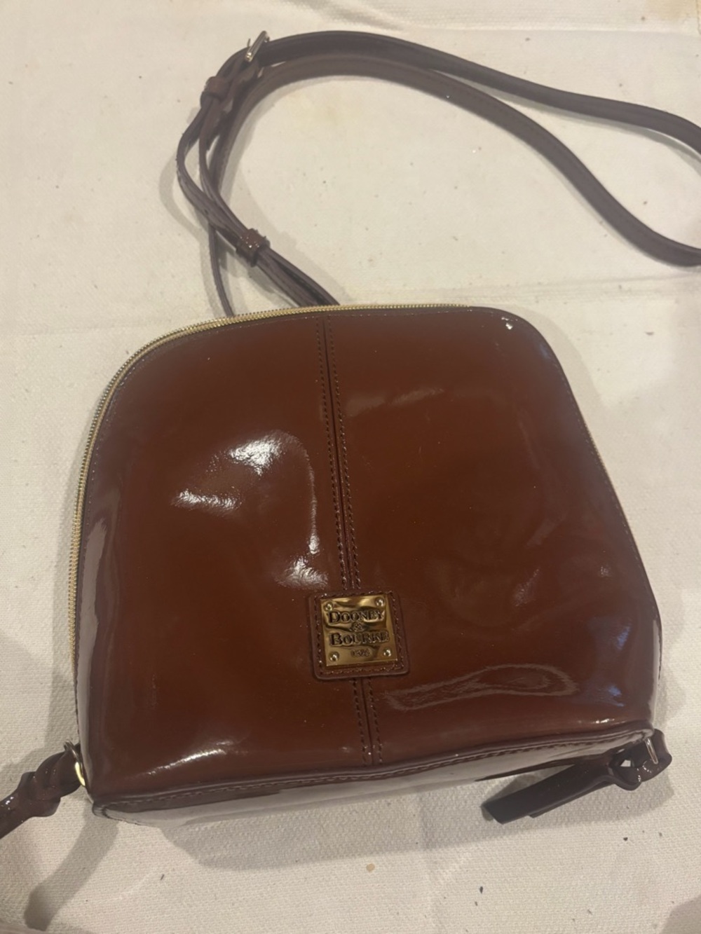 Dooney & Bourke Brown Patent Leather Dome Crossbody
